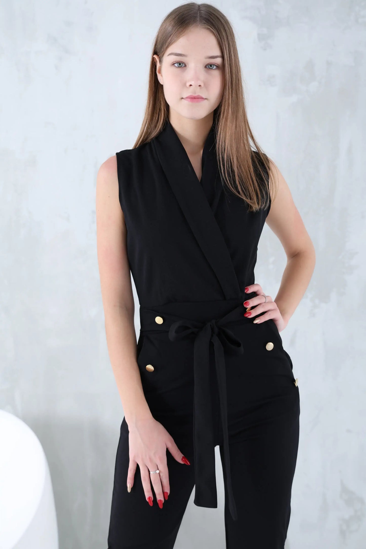 Jumpsuit with simple details and buttons on the pockets