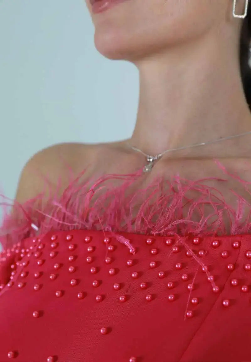 Pink off-the-shoulder dress with pink beading