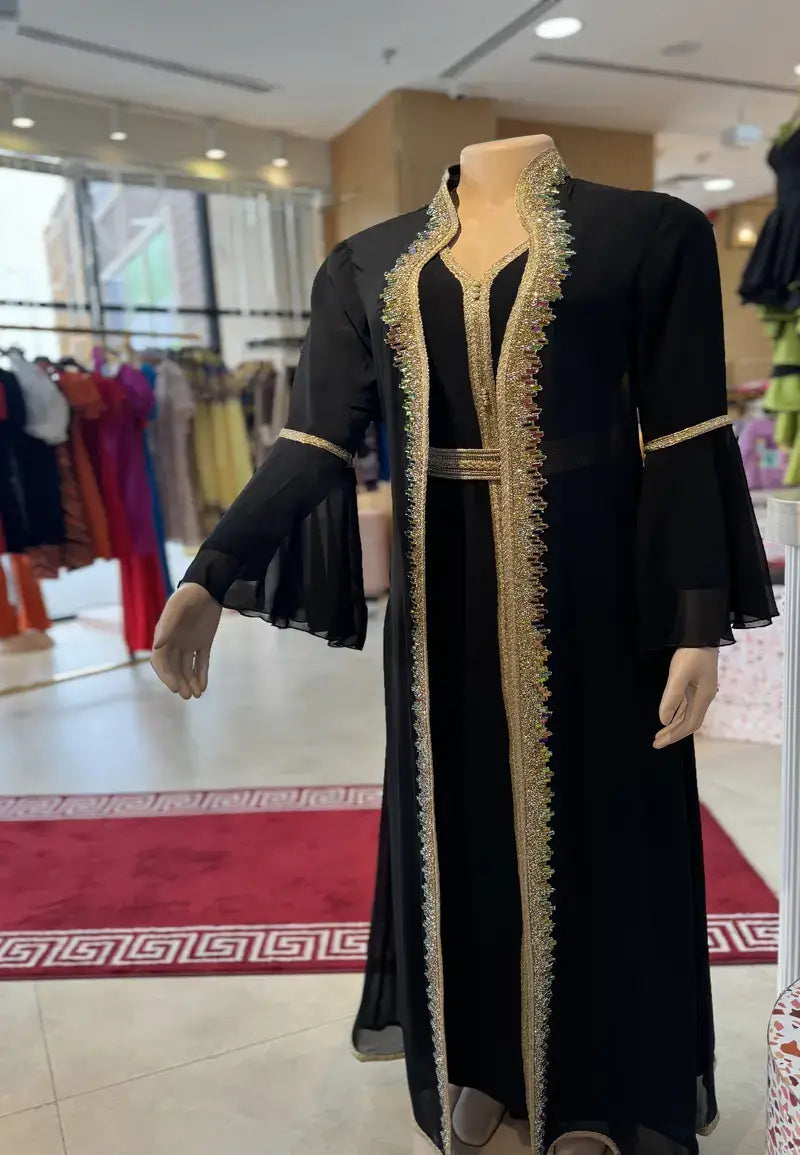 Black caftan with distinctive details and colored crystals