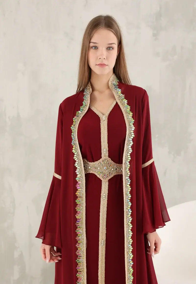 Dark red Moroccan women's caftan decorated with shiny colored crystals