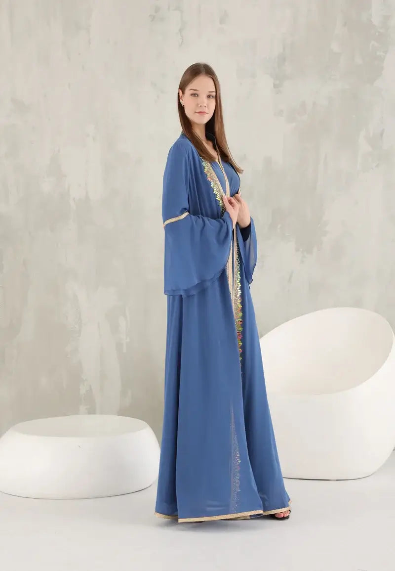 Women's kaftan in a distinctive light blue color with colorful crystals