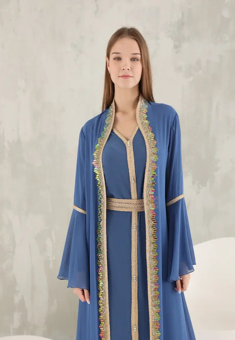 Women's kaftan in a distinctive light blue color with colorful crystals
