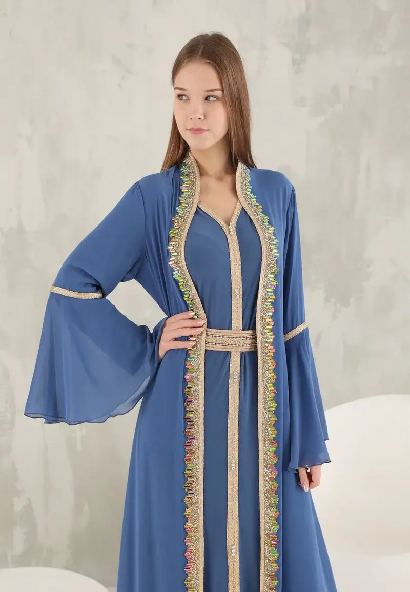 Women's kaftan in a distinctive light blue color with colorful crystals
