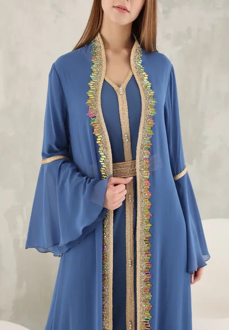 Women's kaftan in a distinctive light blue color with colorful crystals