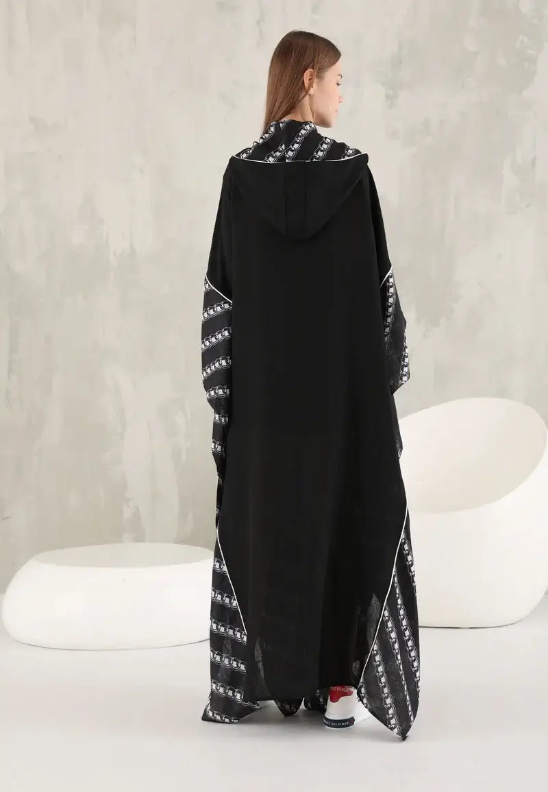 Black women's wide abaya with white threads and a hat