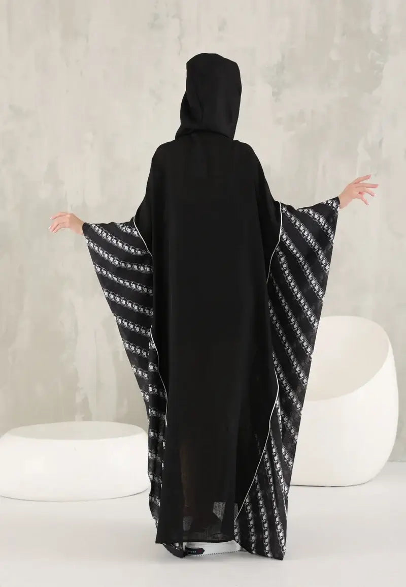 Black women's wide abaya with white threads and a hat