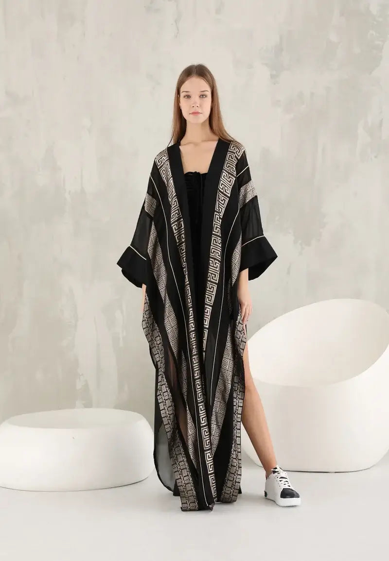 Modern Elegance: Black Abaya with Geometric Gold Accents