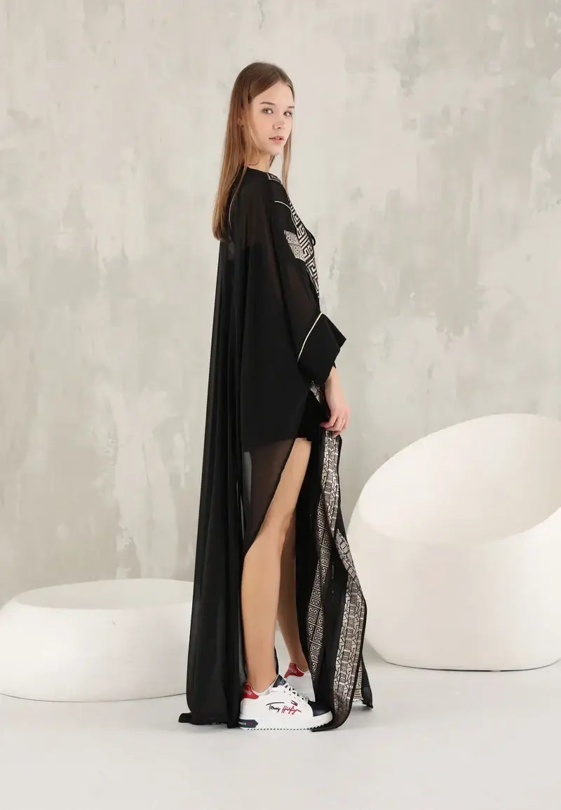 Modern Elegance: Black Abaya with Geometric Gold Accents