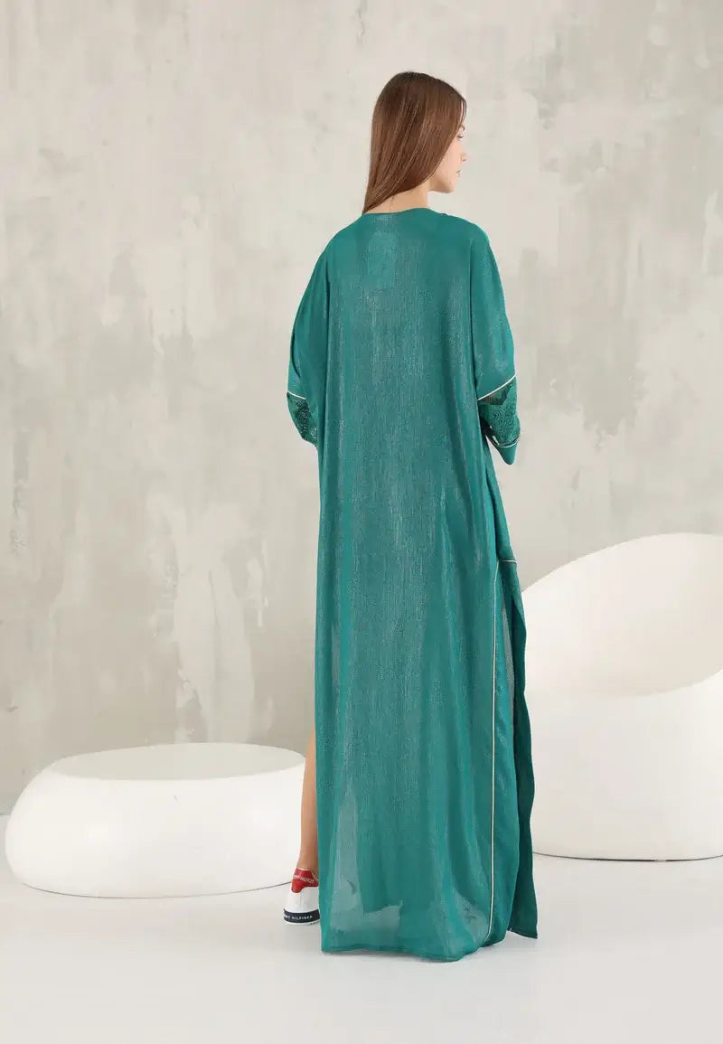 Elegant green shiny women's abaya with golden details