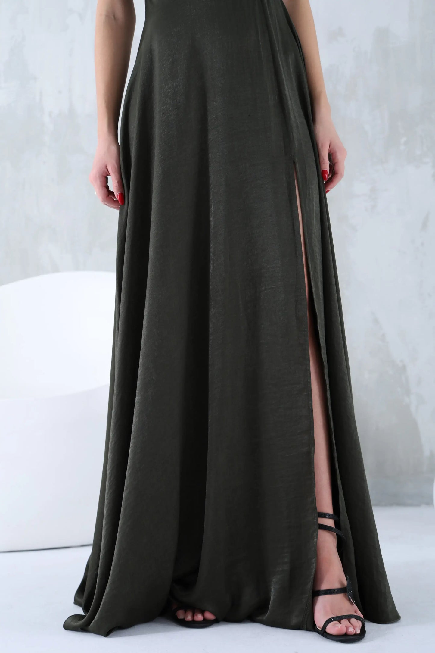 Long olive green sleeveless dress with a round neck