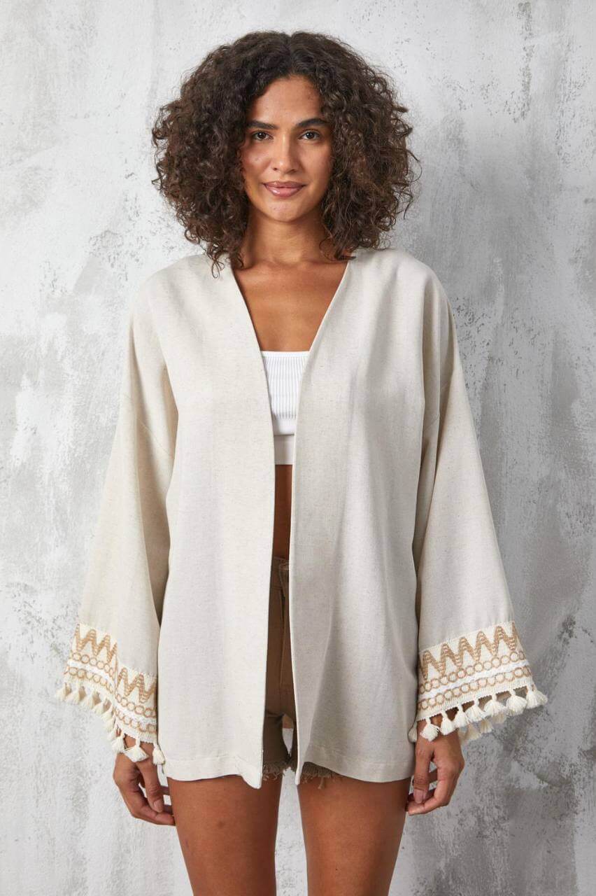 Women's open jacket with patterns on the sleeves