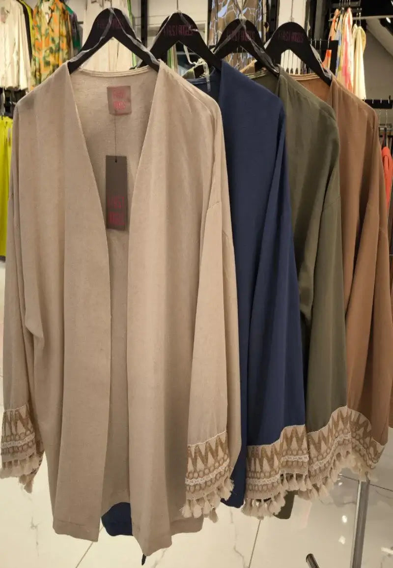 Women's open jacket with patterns on the sleeves