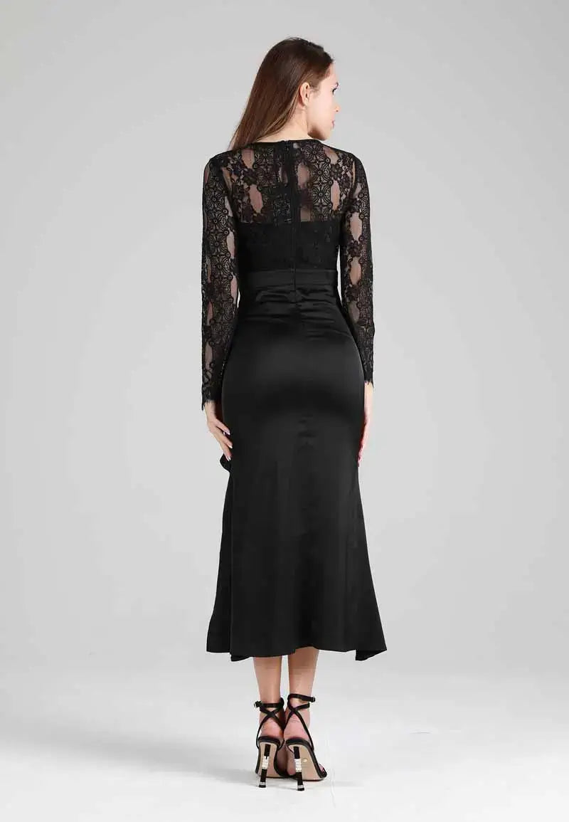 Long black dress with soft and transparent embroidery on the top