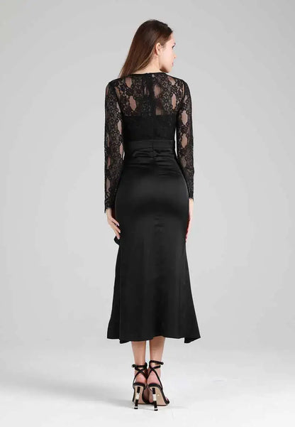 Long black dress with soft and transparent embroidery on the top