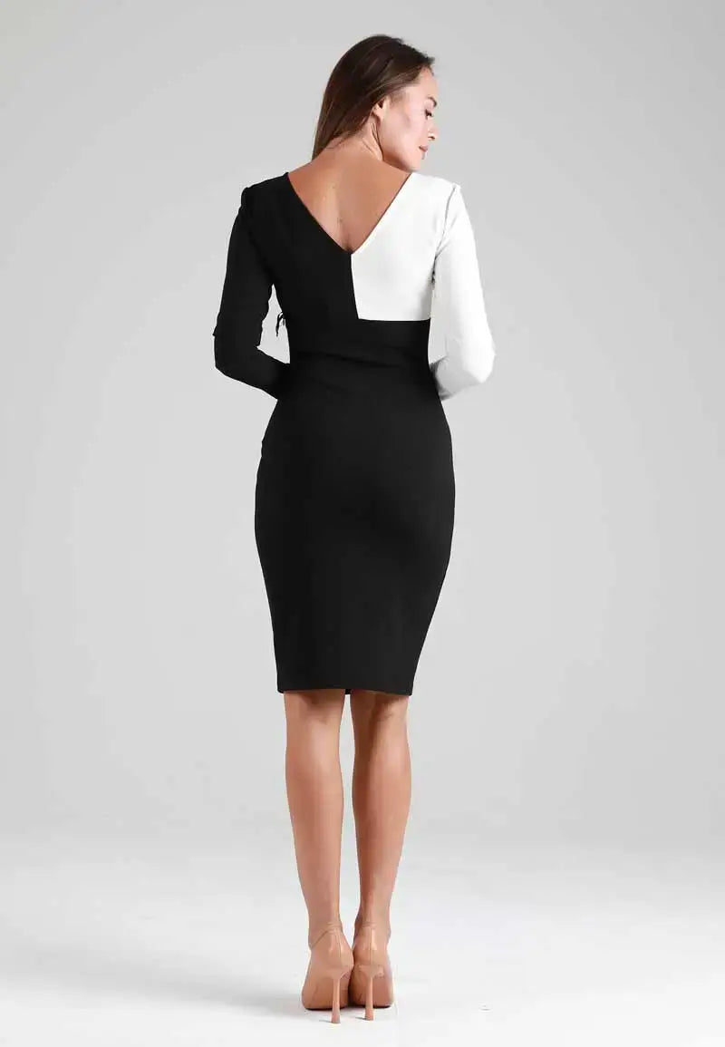 Half black and half white dress with a slit in the back