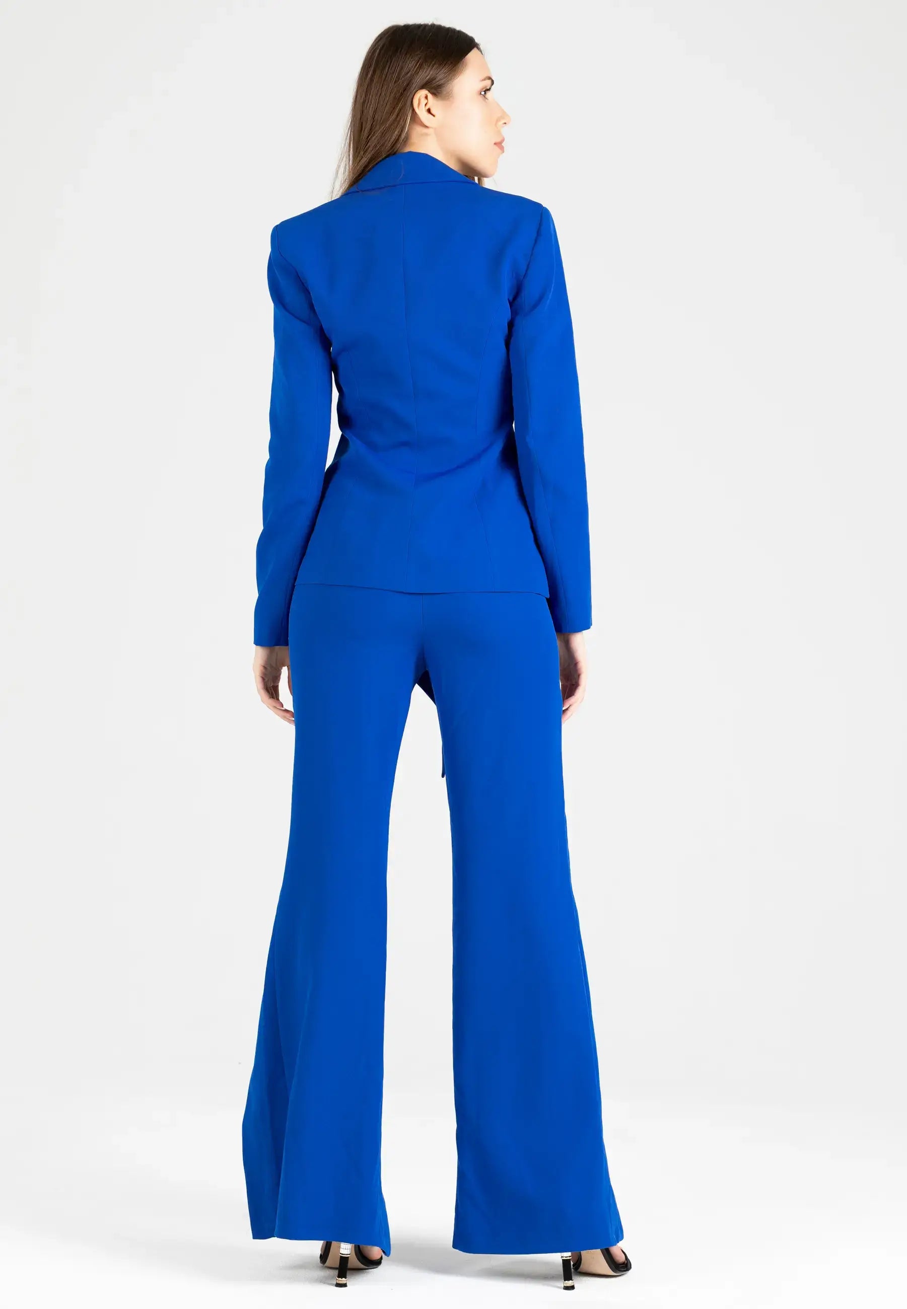 Women's suit consisting of a jacket with a knot and open pants from the bottom