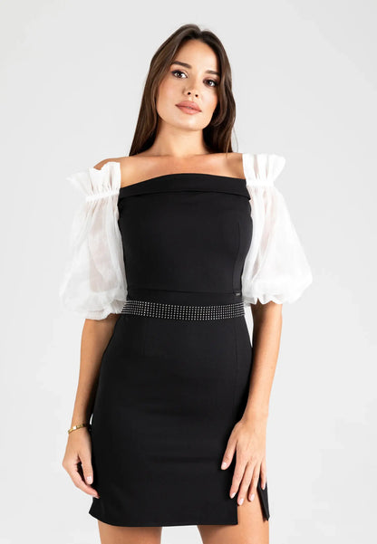 Black dress with white sleeves and soft diamonds at the waist