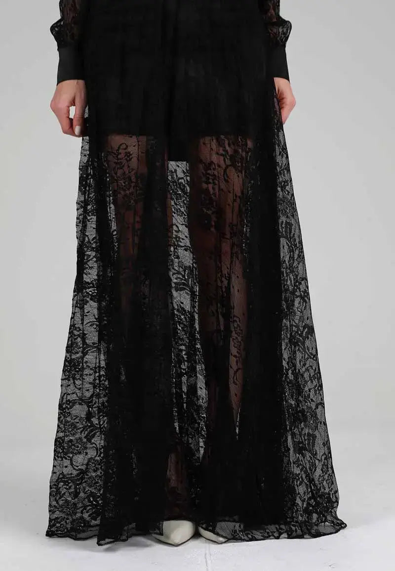 Long black dress embroidered with soft and transparent embroidery