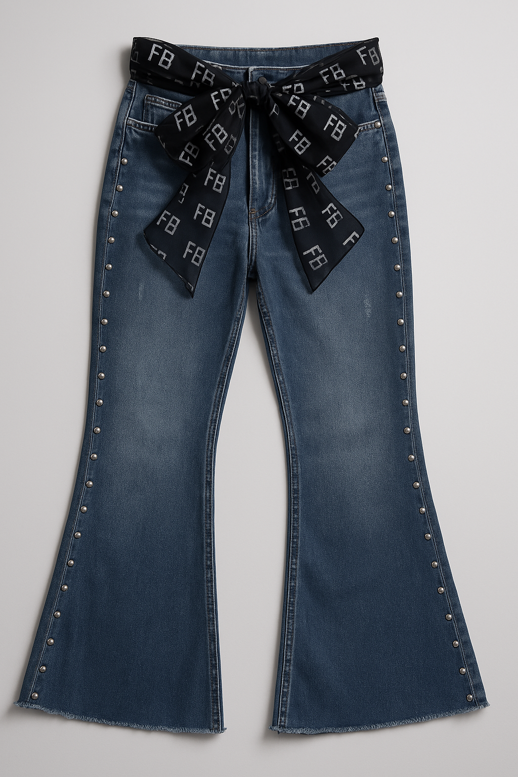 Classic blue jeans with a black chiffon belt